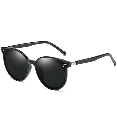 Transparent gray round frame polarized sunglasses with black-gray lenses on a white background. - Image 8