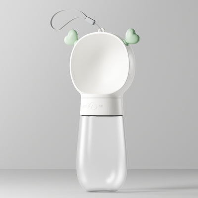 Yellow and clear portable pet water bottle with integrated drinking bowl and separate food container for walking dogs. - Image 15
