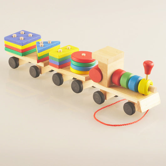 Wooden toy train with a locomotive and two carriages, each carrying colorful shape-sorting blocks. - Image 9