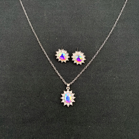 Iridescent teardrop pendant necklace with matching stud earrings, featuring clear accent stones and silver-tone metal. - Image 7