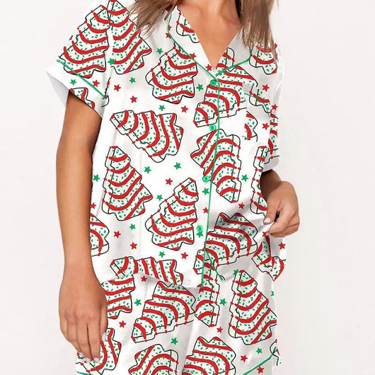 White short-sleeve pajama set with red and green Christmas tree and star print, featuring green piping. - Image 5