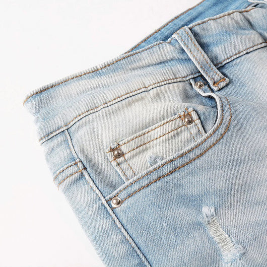 Jeans Azul Cielo Desgastado con Roturas Vintage para Hombre - Image 23