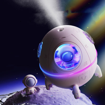 White USB astronaut humidifier shaped like a rocket, emitting mist, with a small astronaut figure inside a clear dome. - Image 5