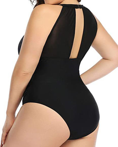 Plus size black one-piece swimsuit with a halter neck and mesh V-neck insert, featuring ruched sides. - Image 22
