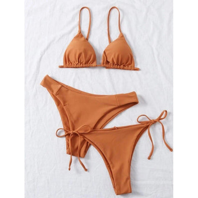 Lavender three-piece bikini set with a triangle top, tie-side bottom, and high-cut bottom, displayed with a straw hat and purple sunglasses. - Image 20