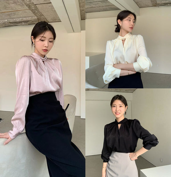 Blusa Elegante con Cuello en V y Mangas Abullonadas