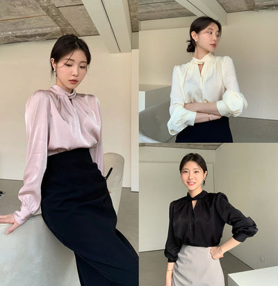 Blusa Elegante con Cuello en V y Mangas Abullonadas