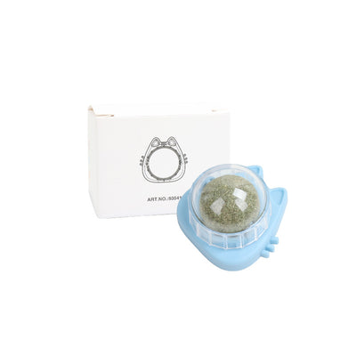 Orange carrot-shaped cat toy with a clear dome holding a rotating catnip ball, next to its white packaging box. - Image 11