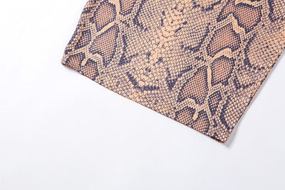 Vestido Ajustado con Falda Cadera Estampado Serpiente y Detalles Calados - Image 17