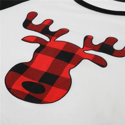 White long-sleeve pajama top with "wild one" graphic and red and black plaid pants. - Image 33
