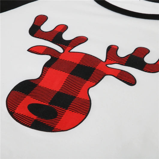 White long-sleeve pajama top with "wild one" graphic and red and black plaid pants. - Image 33