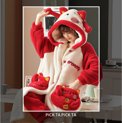 Family of four wearing matching red and cream coral velvet hooded pajamas with embroidered 'money' text and cute pockets. - Image 3