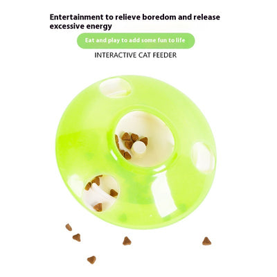 Green and white pet toy, a round food dispenser with multiple openings and a central spinning element for cats. - Image 3