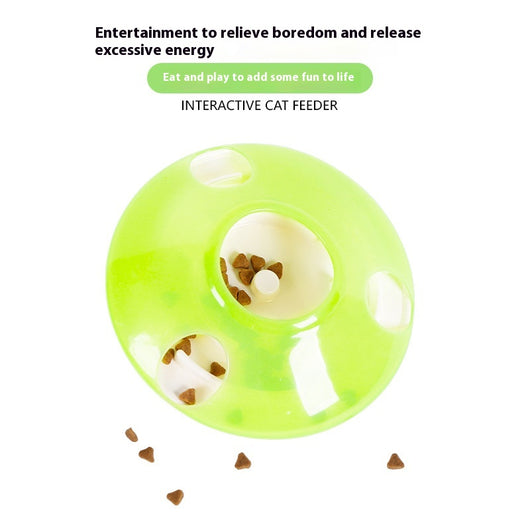Green and white pet toy, a round food dispenser with multiple openings and a central spinning element for cats. - Image 3