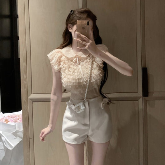 Blusa Elegante con Lazo Francés y Cuello de Solapa en Chifón