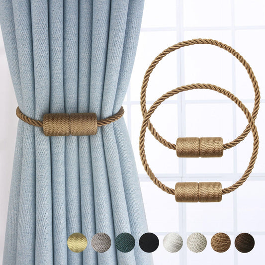 Black cylindrical magnetic curtain tieback holding a light blue pleated curtain, against a clean white background.