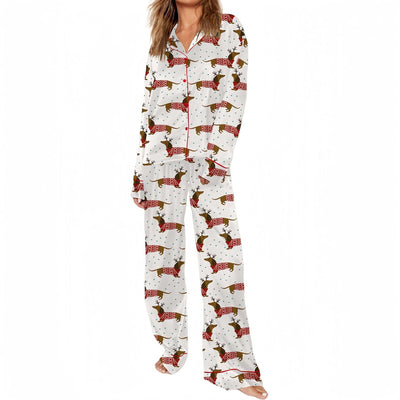 White short-sleeve pajama set with red and green Christmas tree and star print, featuring green piping. - Image 10