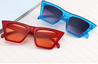 Transparent nude cat-eye sunglasses with brown gradient lenses, featuring a vintage 90s fashion style for women. - Image 8