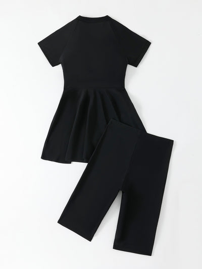 Navy blue two-piece conservative swimwear with short-sleeve peplum top and mid-length shorts, featuring a front zipper. - Image 21