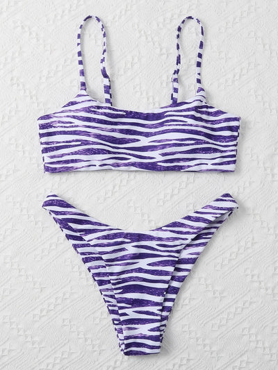 Tan and white zebra stripe two-piece bikini with a bandeau top and high-cut bottom, laid flat. - Image 18