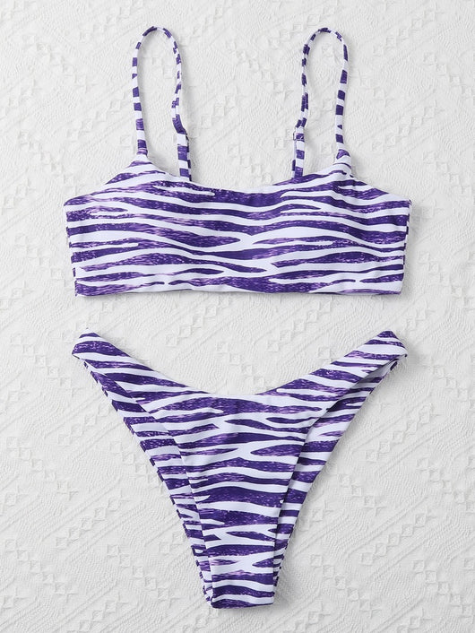 Tan and white zebra stripe two-piece bikini with a bandeau top and high-cut bottom, laid flat. - Image 18