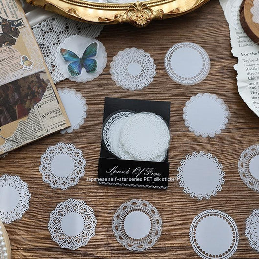 Set of 15 white lace-patterned circular stickers with intricate designs, labeled "North Star Arch" and "30 sheets." - Image 11