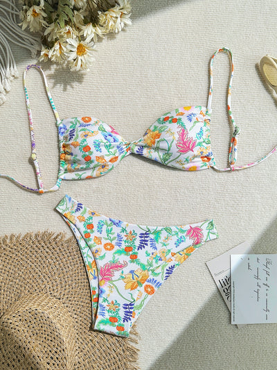 White ribbed two-piece bikini with colorful floral print, featuring a bandeau top and high-cut bottom. - Image 15