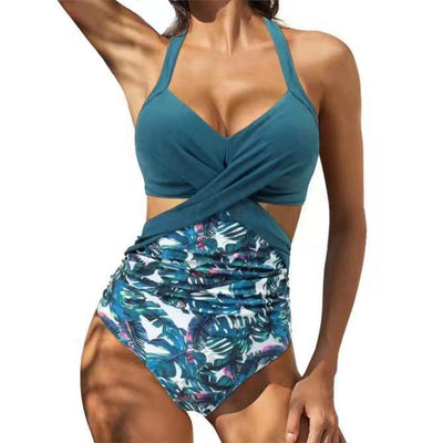 Women's teal halter bikini top with a twisted front and high-waisted bottoms featuring a blue and green tropical leaf print. - Image 7