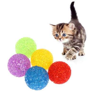 Assortment of colorful textured plastic cat toy balls in red, yellow, blue, purple, pink, and green. - Image 7