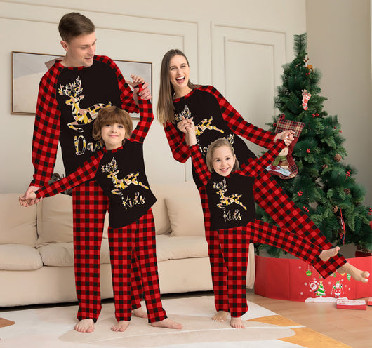 Kids' black and red buffalo plaid pajamas with a colorful deer graphic and "Kids" text on the top. - Image 6