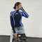 Jumpsuit Deportivo de Cuello Alto con Costuras de Contraste y Diseño Ajustado