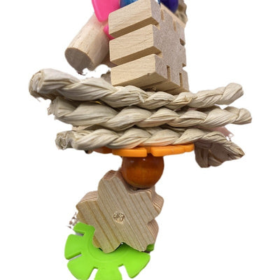 Colorful parrot gnawing toy with wooden blocks, woven straw, and plastic beads, hanging from a metal hook. - Image 4