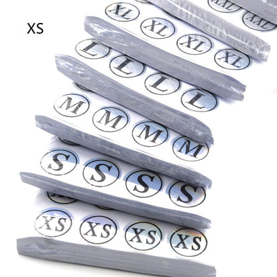Stack of round clothing size stickers with laser color-changing background and black text, from XS to 4XL. - Image 11