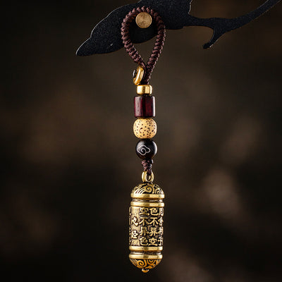 Llavero Colgante Tubo de Latón con Sutra del Corazón Tibetano - Image 10