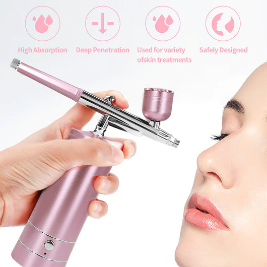 Black and silver oxygen injection beauty instrument with nano spray gun and two clear liquid bottles, spraying colorful mist. - Image 5