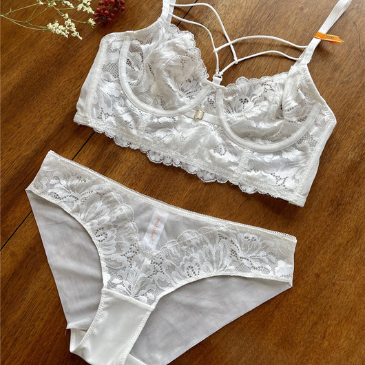 White lace longline bralette with delicate strappy details and underwire cups, featuring a floral pattern. - Image 5