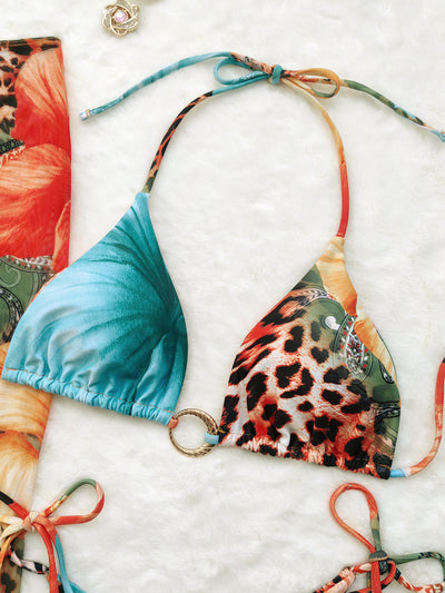 Leopard print and hibiscus floral bikini set with sheer maxi cover-up dress in red, orange, blue, and green. - Image 8