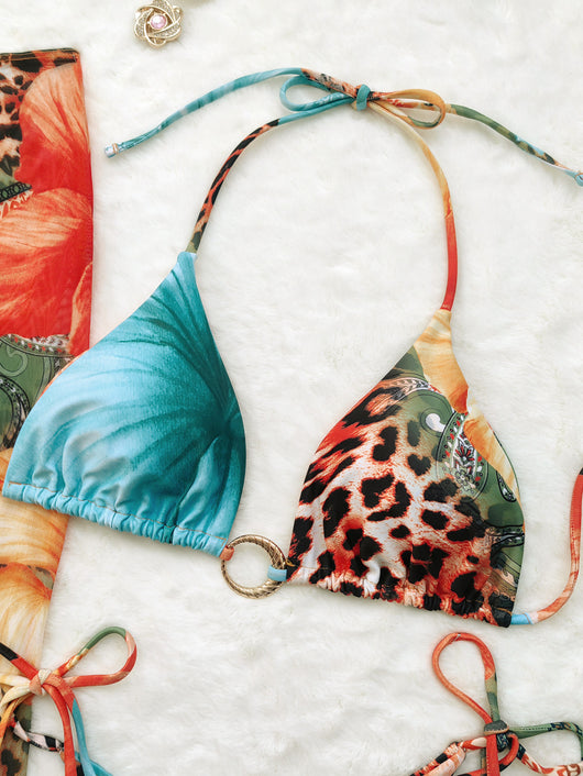 Leopard print and hibiscus floral bikini set with sheer maxi cover-up dress in red, orange, blue, and green. - Image 8