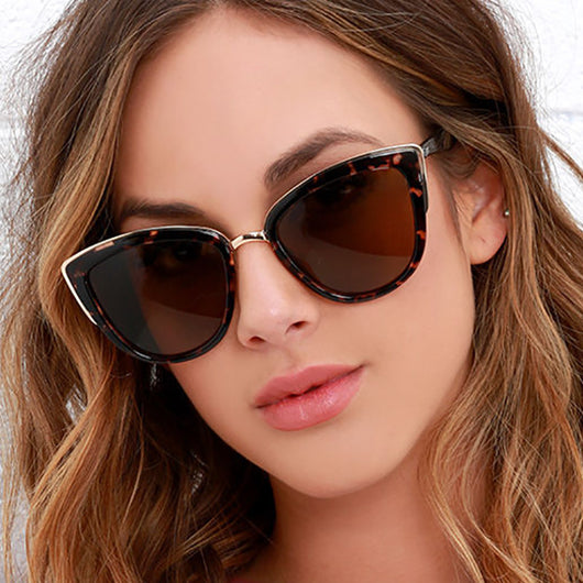 Ladies retro cat eye sunglasses with a tortoiseshell frame, gold accents, and brown gradient lenses. - Image 16