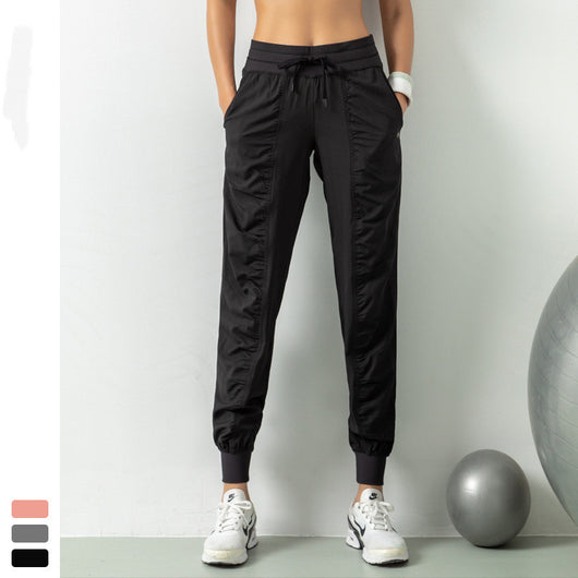 Pantalones deportivos ajustables para running y fitness - Image 10