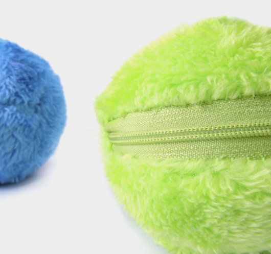 Black electric pet toy ball with four colorful plush covers in pink, lime green, yellow, and blue. - Image 6