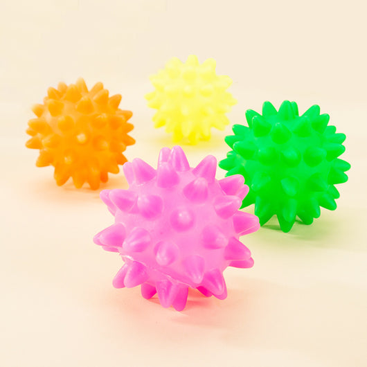 Four colorful spiky rubber pet toy balls in orange, yellow, green, and pink, resembling sea urchins. - Image 4