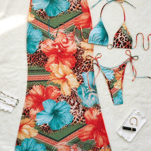 Leopard print and hibiscus floral bikini set with sheer maxi cover-up dress in red, orange, blue, and green. - Image 4