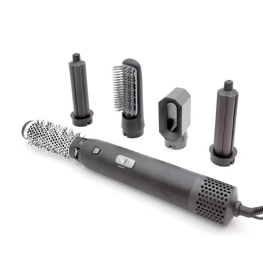 5-in-1 hot air comb hair dryer set with multiple rose red and gray attachments in a white tray. - Image 15