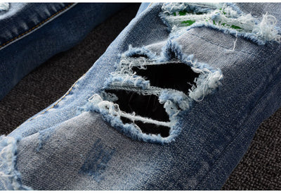 Jeans Slim Rotos a la Rodilla con Detalles en Cuero - Tendencia Urbana - Image 2