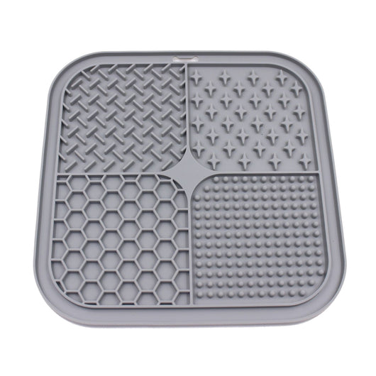 Gray silicone pet licking pad with four textured sections, designed for slow feeding and anti-choking. - Image 8