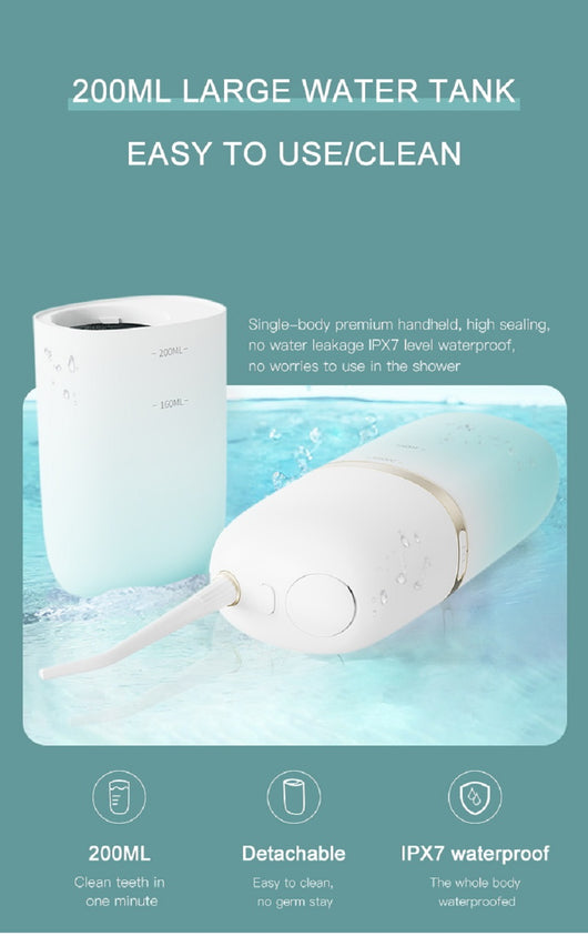 White and rose gold portable electric water flosser with a curved nozzle and volume markings for 160ml and 200ml. - Image 9