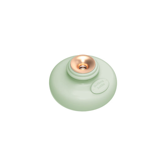 Three 'Drift bottle' humidifiers in white, mint green, and pink, floating in water and emitting mist. - Image 8