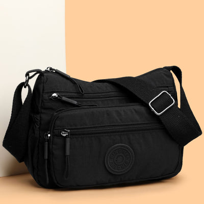 Bolso Bandolera Impermeable de Nylon - Estilo Moderno y Funcional - Image 3