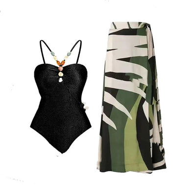 Women's olive green ribbed one-piece swimsuit with colorful beaded straps and matching abstract print sarong skirt. - Image 2